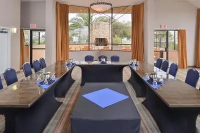 a conference room with a long table and chairs at Holiday Inn Express Hotel & Suites Ventura Harbor by IHG in Ventura