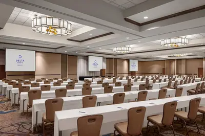 a large room with rows of tables and chairs at Delta Hotels by Marriott Anaheim Garden Grove in Anaheim