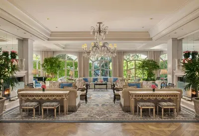 a rendering of a living room with a chandelier at The Peninsula Beverly Hills in Los Angeles