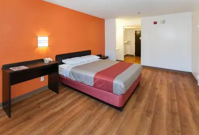 a hotel room with a bed and a desk at Motel 6-Los Angeles, CA - Los Angeles - LAX in Inglewood