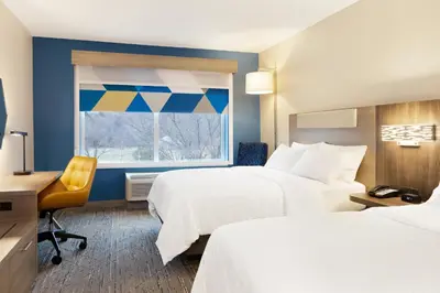 a hotel room with two beds and a window at Holiday Inn Express Hotel & Suites Los Angeles Airport Hawthorne by IHG in Hawthorne