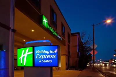 a building with a sign for a holiday inn express and suites at Holiday Inn Express Hotel & Suites Hermosa Beach by IHG in Hermosa Beach