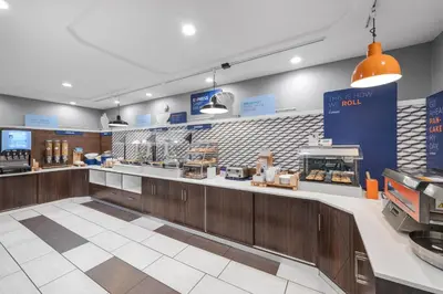 a fast food restaurant with a counter in a store at Holiday Inn Express Hotel & Suites San Dimas by IHG in San Dimas
