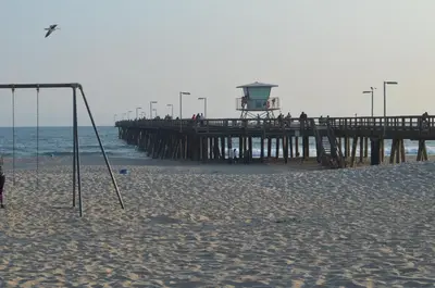 a swing on the beach near a pier at Seaside Inn Motel in Port Hueneme