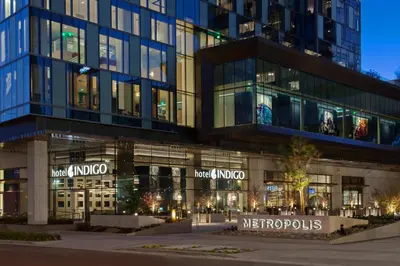 a large glass building with a mexico at Hotel Indigo Los Angeles Downtown by IHG in Los Angeles
