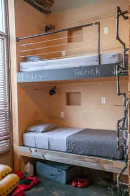 a couple of bunk beds in a room at PodShare Hollywood in Los Angeles