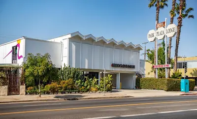 a building on the corner of a street at Park Plaza Lodge in Los Angeles