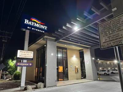 a bank sign on the front of a building at Baymont by Wyndham Bakersfield in Bakersfield