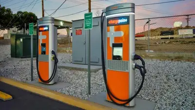 three gas pumps are lined up at a station at Studio 6 Victorville - Apple Valley in Victorville