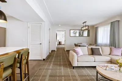 a living room with a couch and a table at Staybridge Suites Oxnard - River Ridge by IHG in Oxnard