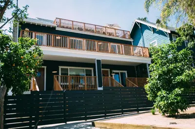 a house with a balcony on top of it at Noon on Sunset Hill in Los Angeles