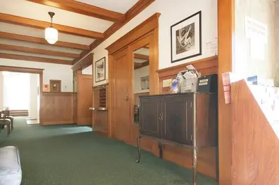 a room with a bar in a building at Orange Drive Hostel in Los Angeles