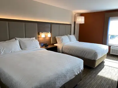 a hotel room with two beds and a window at Holiday Inn Express & Suites Chatsworth by IHG in Chatsworth