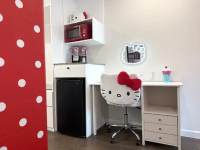 a kitchen with a desk and a hello kitty chair at The Dixie Hollywood in Los Angeles