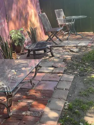 a patio with benches and a table and a fire place at The Village in North Hollywood