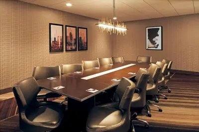 a conference room with a large table and chairs at Homewood Suites By Hilton Los Angeles International Airport in Los Angeles