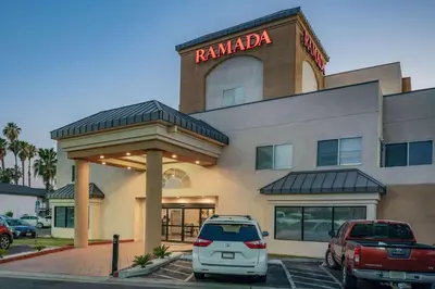 a car parked in front of a hotel at Ramada by Wyndham Bakersfield in Bakersfield