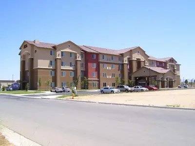 a large building on the side of a street at Hampton Inn and Suites Bakersfield North-Airport in Bakersfield