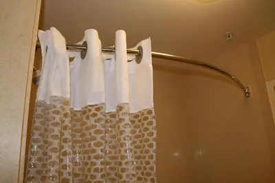 a shower curtain in a bathroom with a shower curtain at Hampton Inn and Suites Barstow in Barstow