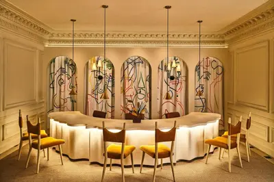 a conference room with a table and chairs at Hotel Per La, Autograph Collection in Los Angeles