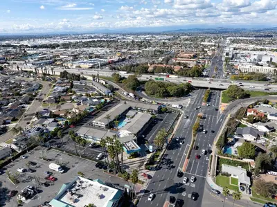 an aerial view of a city with a street at The Buena Park Hotel & Suites in Buena Park