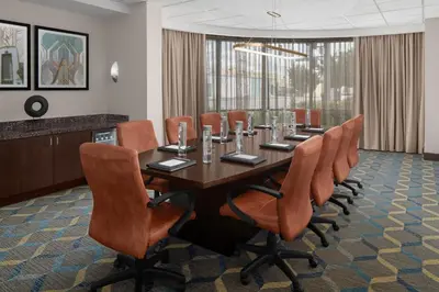 a conference room with a long table and chairs at Residence Inn Los Angeles Burbank/Downtown in Burbank