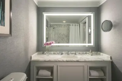 a bathroom with a sink and a mirror at The Ritz-Carlton, Marina del Rey in Los Angeles