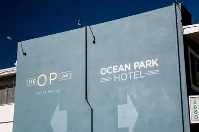 a sign for an ocean park hotel on the side of a building at Ocean Park Hotel in Los Angeles