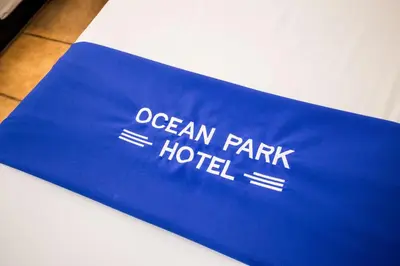 a blue towel with the words ocean park hotel on it at Ocean Park Hotel in Los Angeles