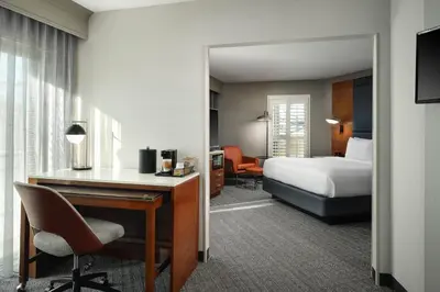 a hotel room with a bed and a desk at Courtyard Los Angeles Century City/Beverly Hills in Los Angeles
