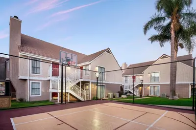 a basketball court in front of a house at Residence Inn Los Angeles Torrance/Redondo Beach in Torrance