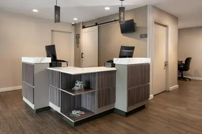 an office with two desks and chairs in a room at Residence Inn Anaheim Placentia/Fullerton in Placentia
