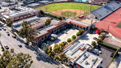 an overhead view of a city with a parking lot at Glenridge Inn Glendale - Pasadena in Glendale