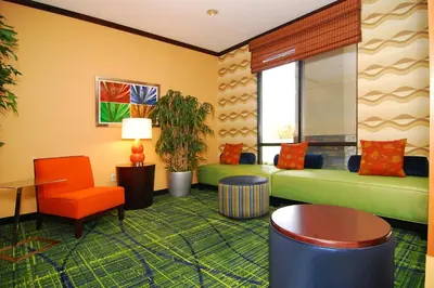 a living room with a couch and a chair at Fairfield Inn & Suites Tehachapi in Tehachapi