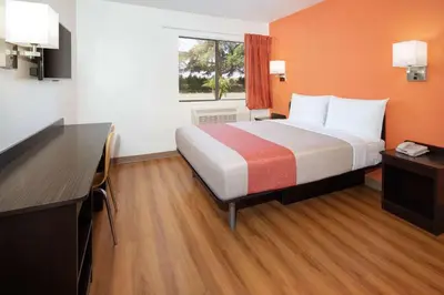 a hotel room with a bed and a desk at Motel 6-Arcadia, CA - Los Angeles - Pasadena Area in Arcadia
