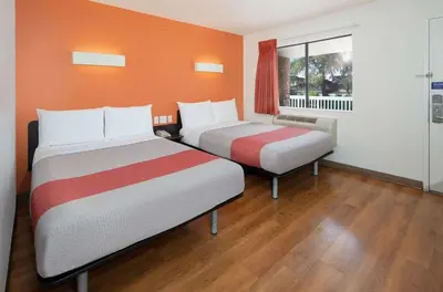 a hotel room with two beds and a window at Motel 6-Arcadia, CA - Los Angeles - Pasadena Area in Arcadia