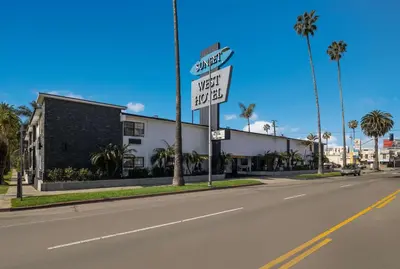 a street sign on the side of a road at Sunset West Hotel, SureStay Collection By Best Western in Los Angeles