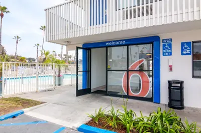a welcome sign in a mobil gas station at Motel 6-Ventura, CA - Beach in Ventura