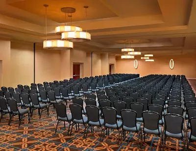 an empty conference room with chairs and chandeliers at Sheraton Agoura Hills Hotel in Agoura Hills