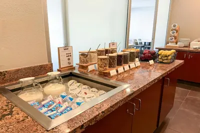 a counter in a room with food on it at Residence Inn La Mirada Buena Park in La Mirada