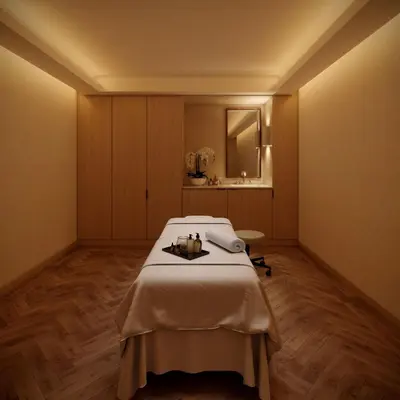 a hospital room with a bed and a mirror at Regent Santa Monica Beach in Los Angeles