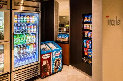 a refrigerator filled with lots of different types of drinks at Courtyard by Marriott Thousand Oaks Ventura County in Thousand Oaks