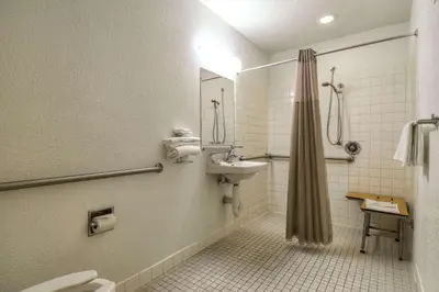 a bathroom with a sink and a toilet and a shower at Motel 6-San Dimas, CA - Los Angeles in San Dimas
