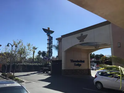 a car parked in front of a theater at Thunderbird Lodge in Riverside