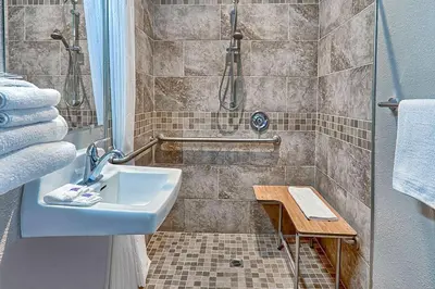 a bathroom with a sink and a shower at Motel 6-Lancaster, CA in Lancaster