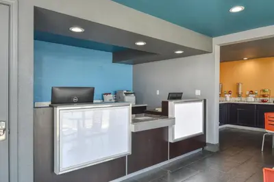 a kitchen with a counter with a laptop on it at Vagabond Inn Buttonwillow North I-5 in Buttonwillow