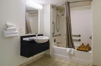a bathroom with a sink and a shower at Motel 6-Barstow, CA in Barstow