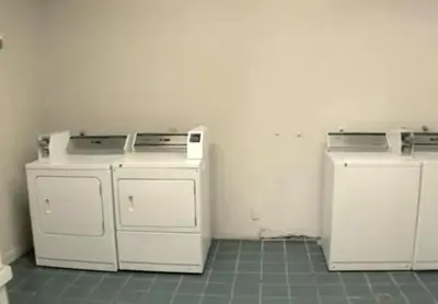 a kitchen with three appliances in a room at Motel 6-Buttonwillow, CA Central in Buttonwillow