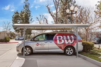 a small car parked at a bus stop at Best Western Plus Heritage Inn Ontario Rancho Cucamonga in Rancho Cucamonga