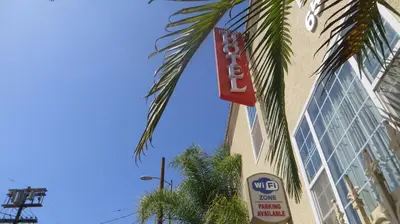 a sign on the side of a building at Trylon Hotel - Hollywood in Los Angeles